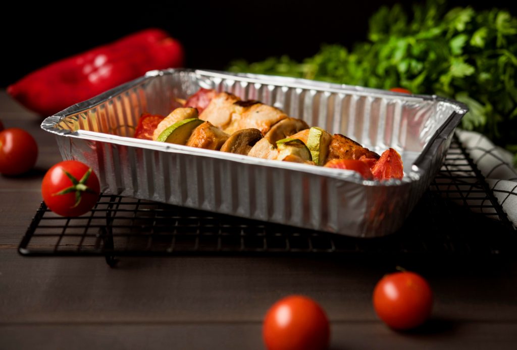 High Angle Chicken Skewers Tray With Red Pepper Cherry Tomatoes 1024x693